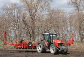 The Massey Ferguson 6713 tractor on a farm in Tambov Region